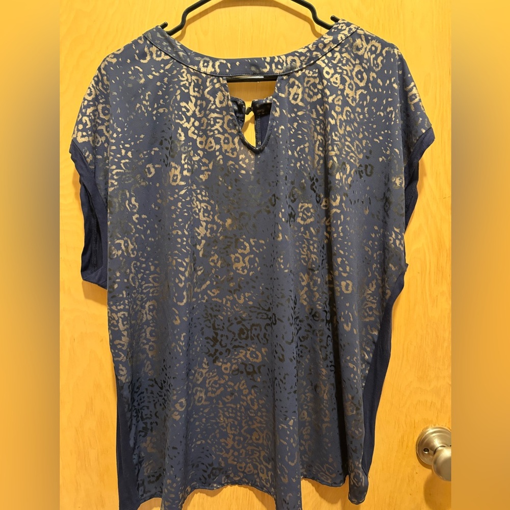 Navy blue and gold short sleeve blouse.